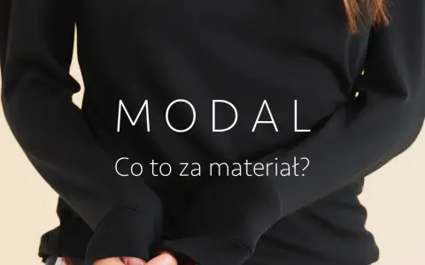 Osoba w czarnej bluzce z napisem "MODAL Co to za materiał?". Poznaj zalety modalu.